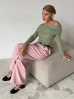 FJØRNA women's off-shoulder ribbed knit top in soft fabric, featuring a fitted design and stylish neckline.