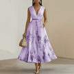 FJØRNA pleated belted A-line maxi dress for women, featuring a flowy silhouette and stylish design, shown in the image.