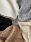 Women’s FJØRNA cashmere top featuring a soft, cozy fit and stylish design, perfect for casual or elegant outfits.