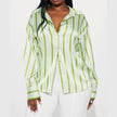 FJØRNA satin blouse for women, elegant women's tops with smooth, shiny fabric and a stylish fit, shown in a flattering design.