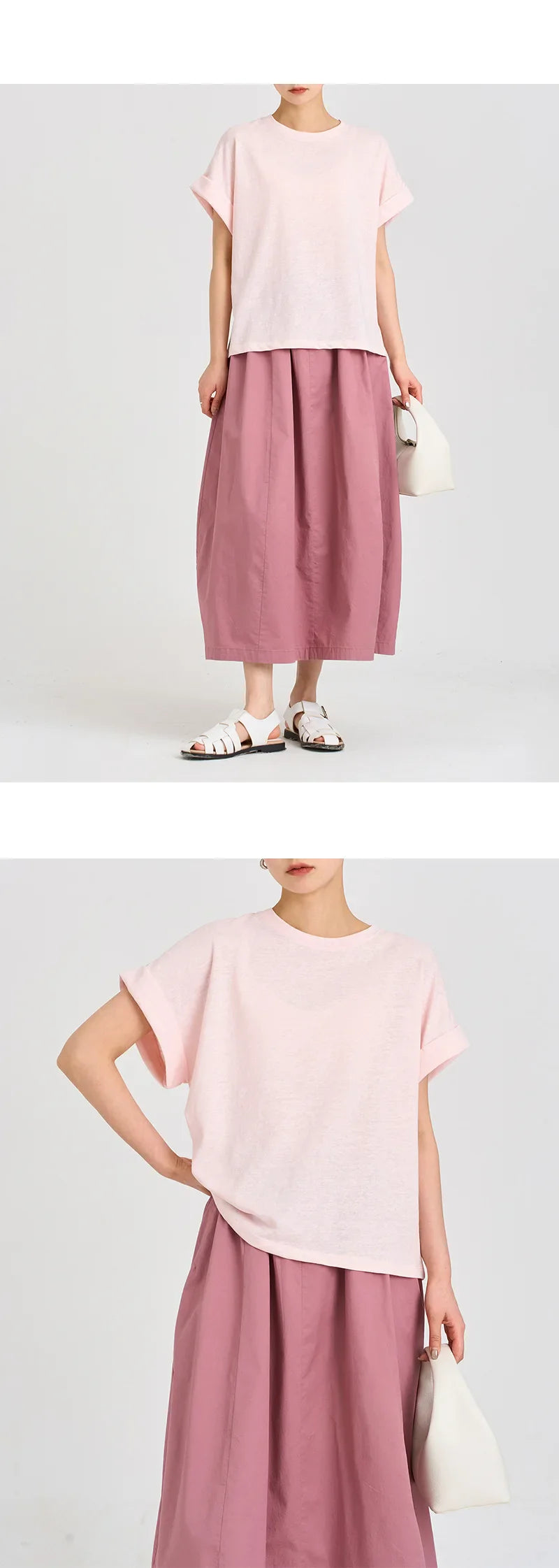 FJØRNA oversized tee with rolled cuffs, featuring a relaxed fit and casual style, shown in a front view.