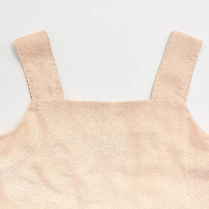 FJØRNA square neck linen cropped tank top displayed flat with natural fabric texture and clean design.