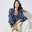 Lacceti Maren Stripe Satin Blouse featuring a relaxed fit, soft satin fabric, and stylish vertical stripe pattern.