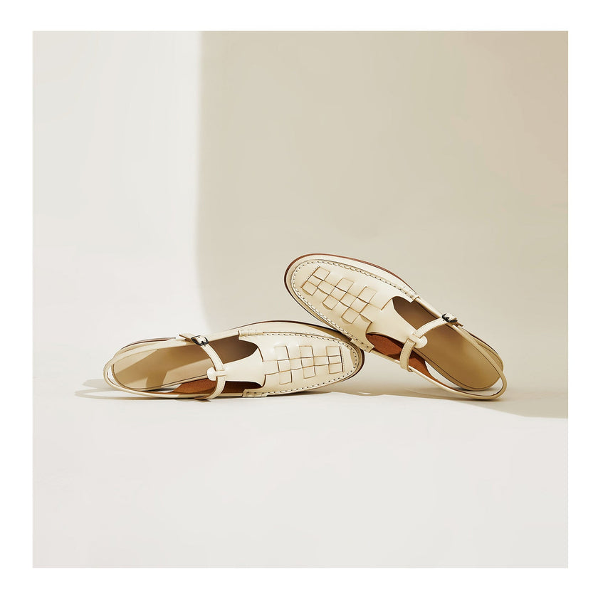 FJØRNA women's Italian leather slingback sandals with woven summer design and open toe for warm weather wear.