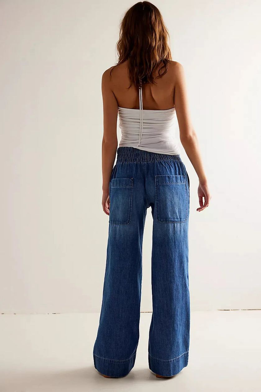 FJØRNA women's wide-leg denim jeans, stylish pants with a relaxed fit, displayed on a neutral background.