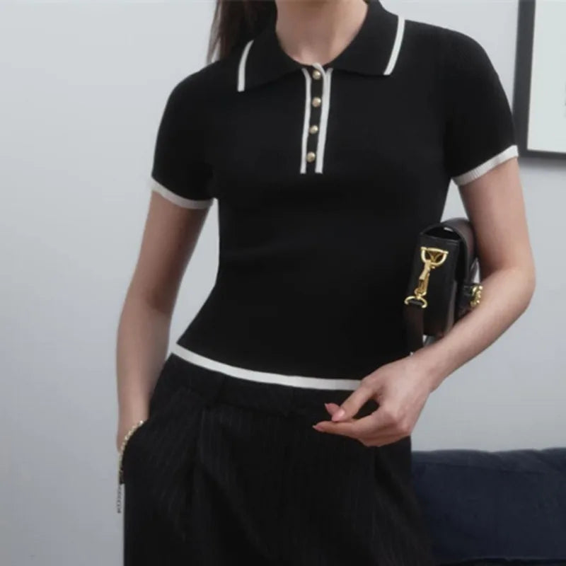 Light pink cotton polo top for women by FJØRNA, featuring a classic collar and short sleeves, styled on a mannequin.