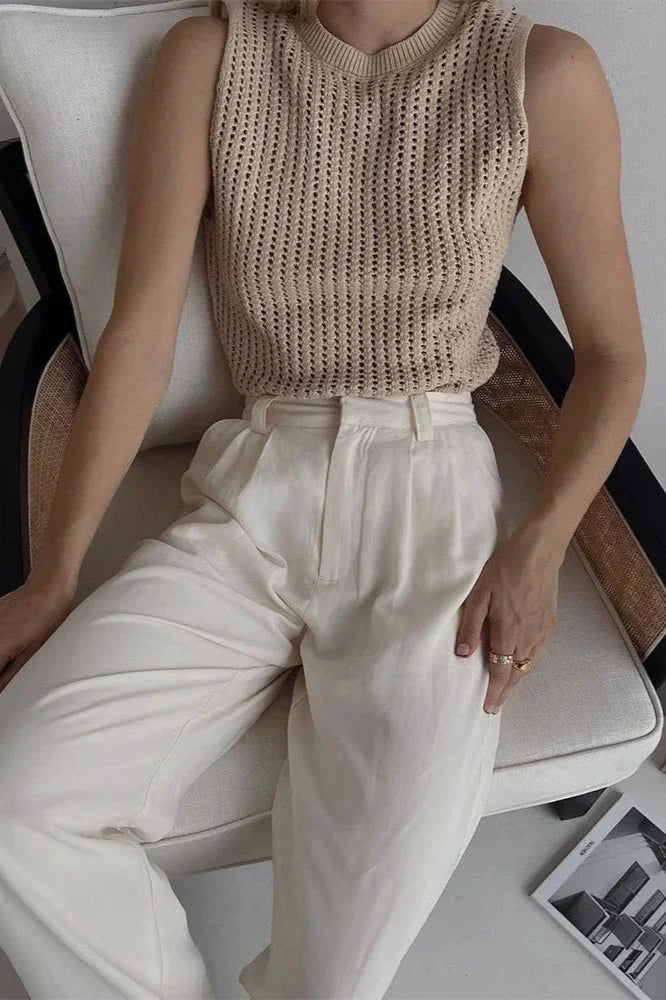 FJØRNA women's sleeveless knit tank top, lightweight and cozy, shown in a close-up of the soft, textured fabric.
