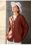 FJØRNA women's linen V-neck shirt, light and breathable top made of soft linen fabric, displayed on a neutral background.