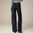 Women’s wide-leg cotton jeans by FJØRNA featuring high waist and relaxed fit, shown in a natural denim color.