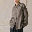 Women's linen blend shirt by FJØRNA, shown as a stylish casual top with a relaxed fit and natural fabric texture.