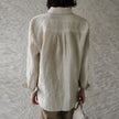 FJØRNA women's linen shirt with pleated design, long sleeves, and a relaxed fit, perfect for casual and stylish summer wear.