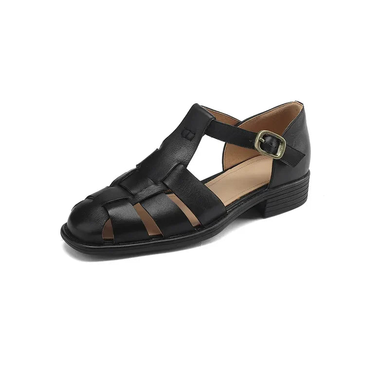 FJØRNA women's Italian leather sandals with adjustable straps, featuring a stylish open-toe design and comfortable flat soles.