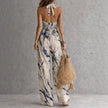 FJØRNA Madison Flowy Halter Maxi Dress in white, lightweight fabric with a flowing silhouette and halter neckline, perfect for summer.