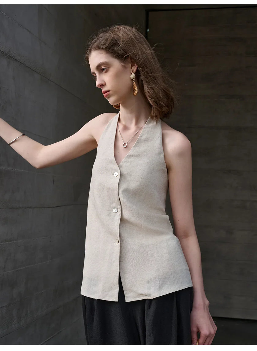 FJØRNA women's linen waistcoat with halter neck and sleeveless design, stylish top for warm-weather wear.