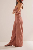 FJØRNA women's knit wide-leg trousers in a co-ord set, featuring a relaxed fit and soft knit fabric.