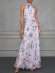 FJØRNA Jasmine floral halter wedding guest dress with elegant floral pattern and flowing fabric, suitable for special occasions