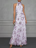 FJØRNA Jasmine floral halter wedding guest dress with elegant floral pattern and flowing fabric, suitable for special occasions