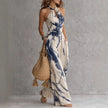 FJØRNA Madison flowy halter maxi dress in white featuring a relaxed fit and elegant design, perfect for summer occasions.