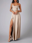 White FJØRNA Maxi Dress with spaghetti straps, elegant sleeveless evening gown, flowing fabric, perfect for formal occasions