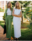 FJØRNA women's linen crop top with short sleeves and V-neck, light and breathable fabric ideal for warm weather.