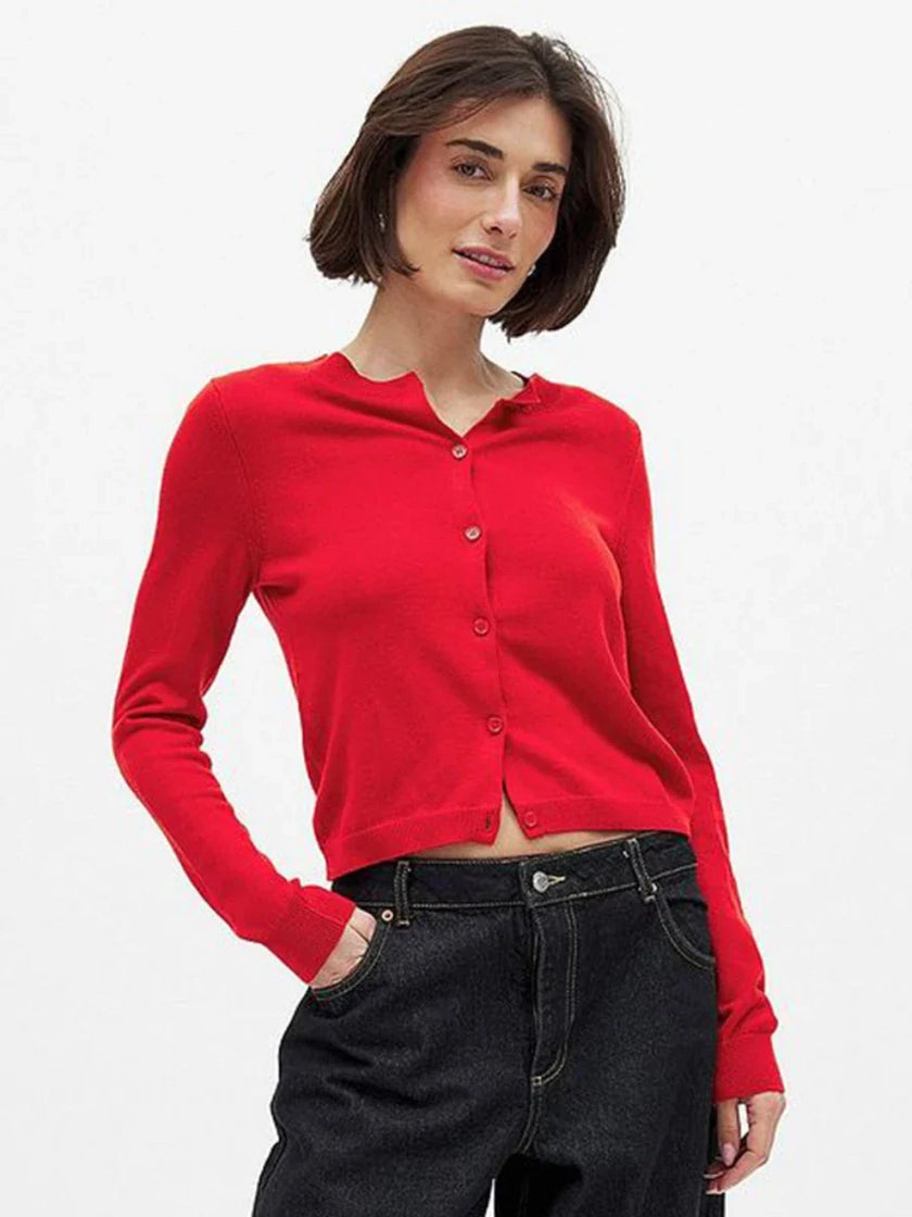 FJØRNA women's knit cardigan, cozy and stylish, with a soft textured fabric and button closure, perfect for layered looks.
