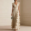FJØRNA Patricia Ruffle Trim White Maxi Dress with flowing fabric and elegant ruffle details, perfect for summer or special occasions.