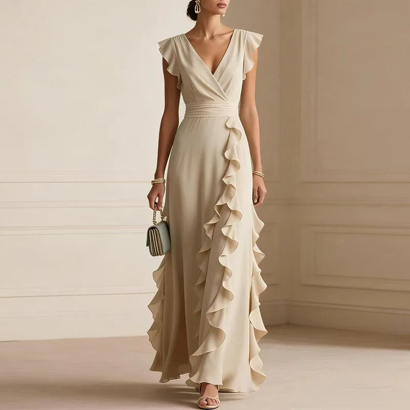 FJØRNA Patricia Ruffle Trim White Maxi Dress with flowing fabric and elegant ruffle details, perfect for summer or special occasions.