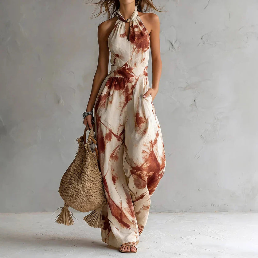 FJØRNA Madison Flowy Halter Maxi Dress in white, sleeveless design with a flowing silhouette and halter neckline.