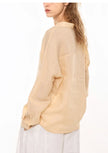Women’s linen V-neck shirt by FJØRNA, featuring a relaxed fit and natural fabric texture, ideal for casual summer wear.