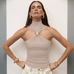 FJØRNA women's silk halter neck top in elegant design, showcasing smooth silk fabric and stylish neckline.