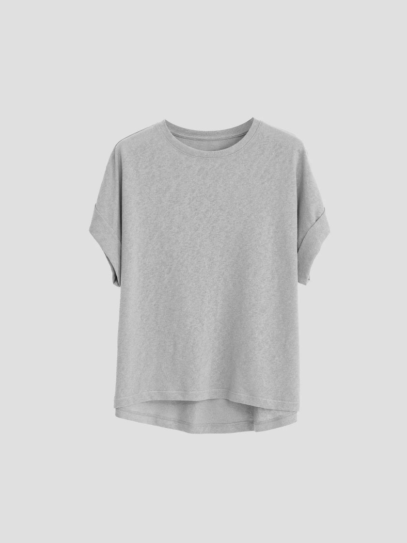 FJØRNA oversized women's tee with rolled cuffs, relaxed fit, soft fabric, and casual style, displayed on a model.