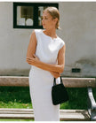 FJØRNA linen crop top for women, lightweight and breathable, featuring a stylish cropped design and relaxed fit.