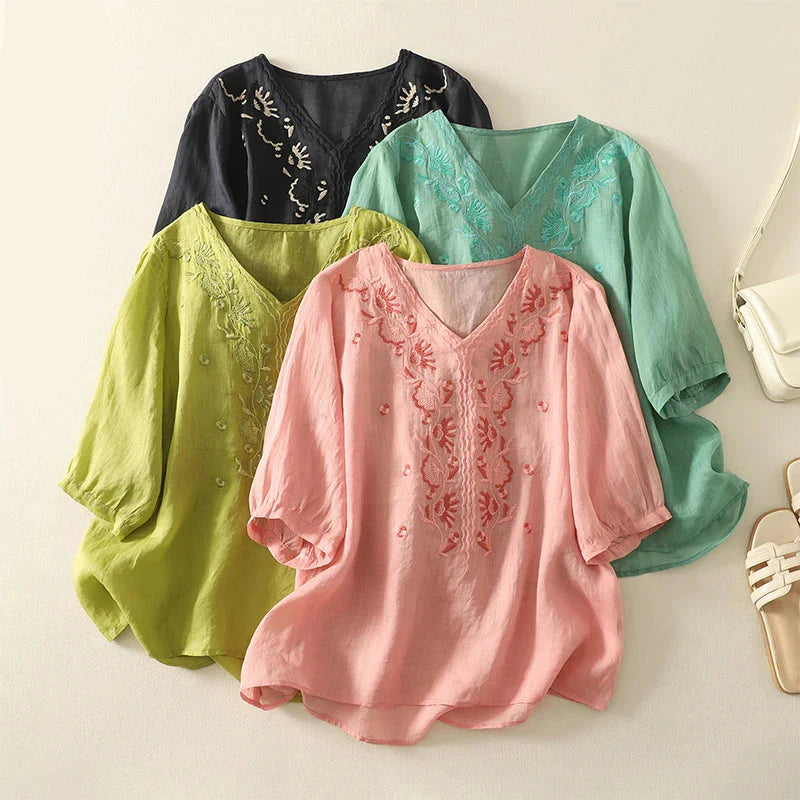 FJØRNA women's cotton V-neck blouse, stylish and comfortable tops for women, shown in a light-colored fabric.