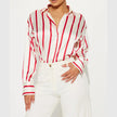 FJØRNA satin blouse for women featuring a sleek, elegant design with long sleeves and a smooth, shiny fabric.