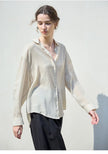 FJØRNA women's linen shirt, light and breathable top, shown in a natural relaxed fit with long sleeves and a classic collar.