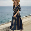 FJØRNA Carter Summer elegant casual wedding dress with a flowing design and soft fabric, suitable for summer occasions.