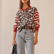FJØRNA women's cotton cardigan, soft and cozy, shown in a neutral color, styled as a versatile women's top.