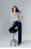 Lacceti Maren Stripe Satin Blouse with long sleeves and a relaxed fit, featuring elegant vertical stripe pattern and silky satin fabric.