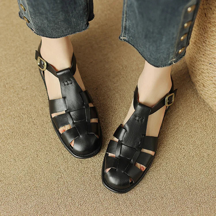 FJØRNA Italian leather women's sandals with adjustable straps, featuring a stylish open-toe design and comfortable flat sole.