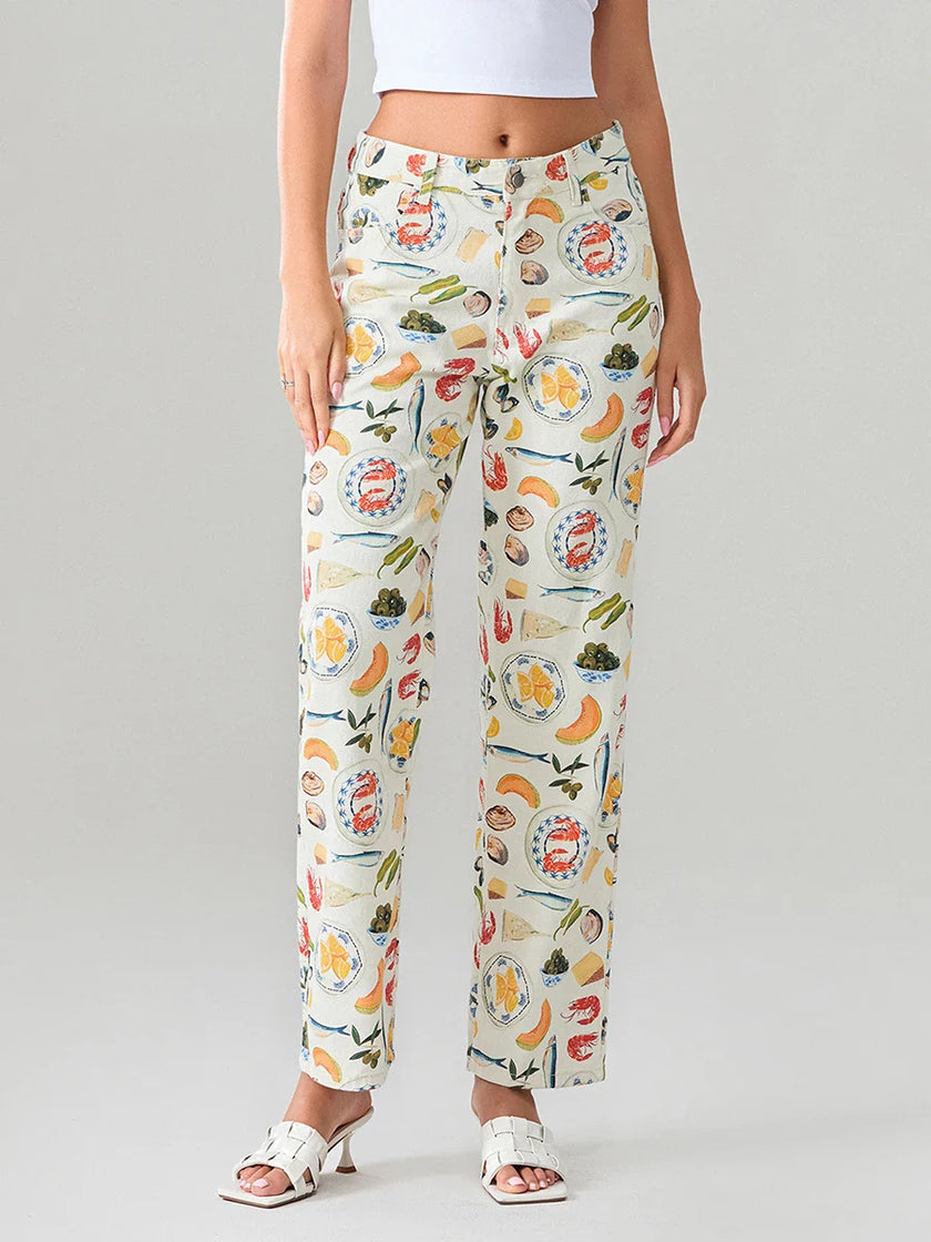 FJØRNA women's denim jeans, casual pants with classic five-pocket design, shown on a model in a relaxed fit style.
