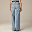 Wide-leg high-waist cotton jeans for women by FJØRNA, showing the relaxed fit and classic denim texture.