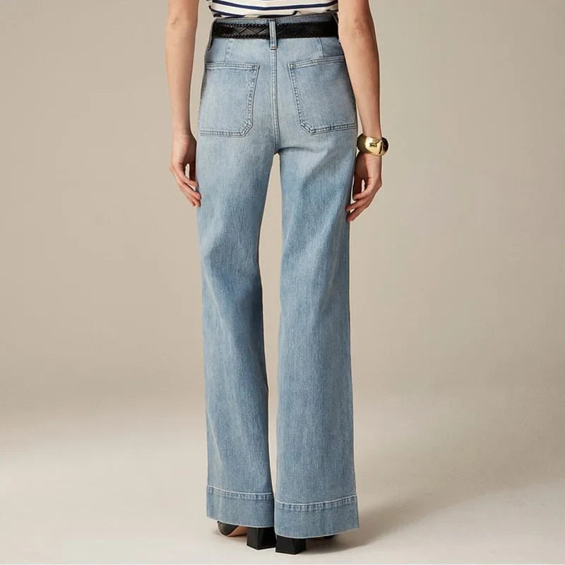 Wide-leg high-waist cotton jeans for women by FJØRNA, showing the relaxed fit and classic denim texture.