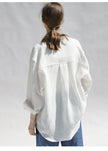 FJØRNA women's linen blouse with long sleeves, lightweight and breathable top, natural fabric and relaxed fit.