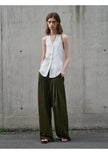 FJØRNA women's linen waistcoat with halter neck and sleeveless design, stylish top for warm weather.