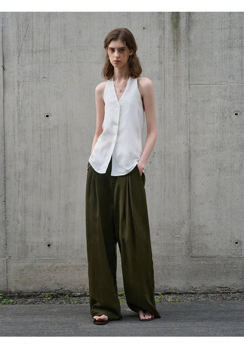 FJØRNA women's linen waistcoat with halter neck and sleeveless design, stylish top for warm weather.