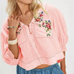 FJØRNA women's embroidered crop top, stylish and lightweight, featuring intricate embroidery and a trendy fit.