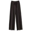 Women's wide-leg Merino wool trousers by FJØRNA, high-waist, stylish and cozy for casual or office wear.
