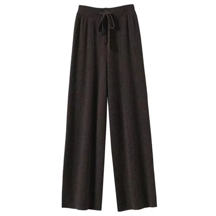Women's wide-leg Merino wool trousers by FJØRNA, high-waist, stylish and cozy for casual or office wear.