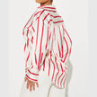 FJØRNA satin blouse for women, elegant women's top with smooth, shiny fabric and classic design, shown in the image.