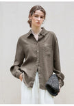 FJØRNA women's linen blend shirt, stylish lightweight top with a relaxed fit, featuring a button-up front and classic collar.